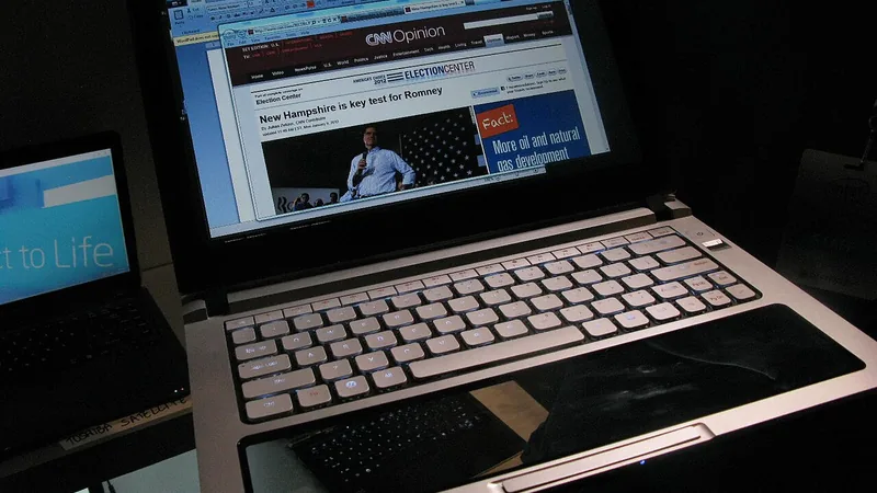 A laptop displaying a webpage on a desk